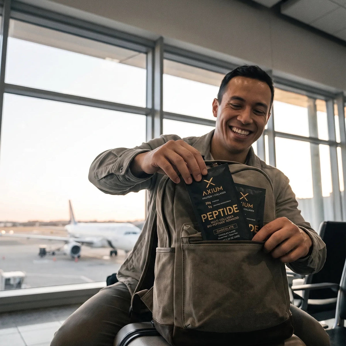 Axium Athletics sachets in a backpack at the airport — fits in your carry-on